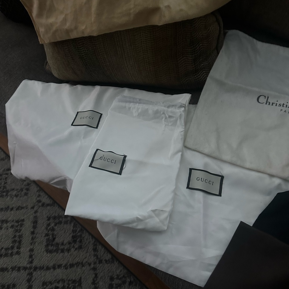 Hand bag dust bags 30 in total all names and sizes,